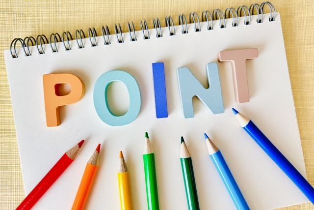 POINTの文字と色鉛筆