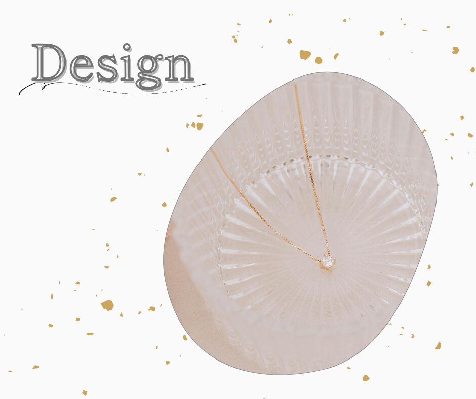 一粒ダイヤのゴールドチェンネックレスとDesignの文字