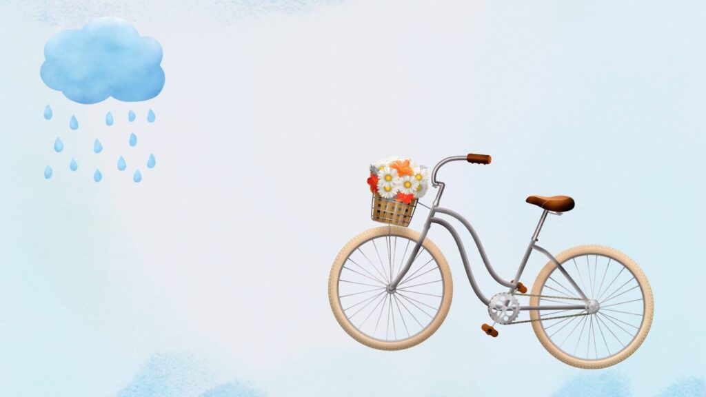水色の背景に雲と雨と自転車